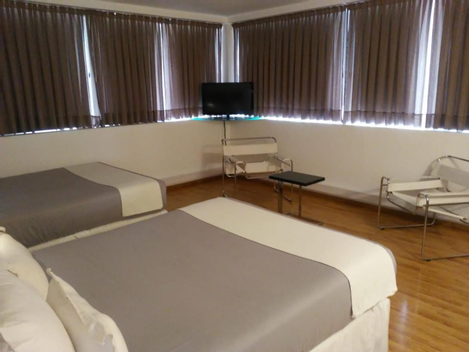 Global Hotel Сентенарио Екстериор снимка