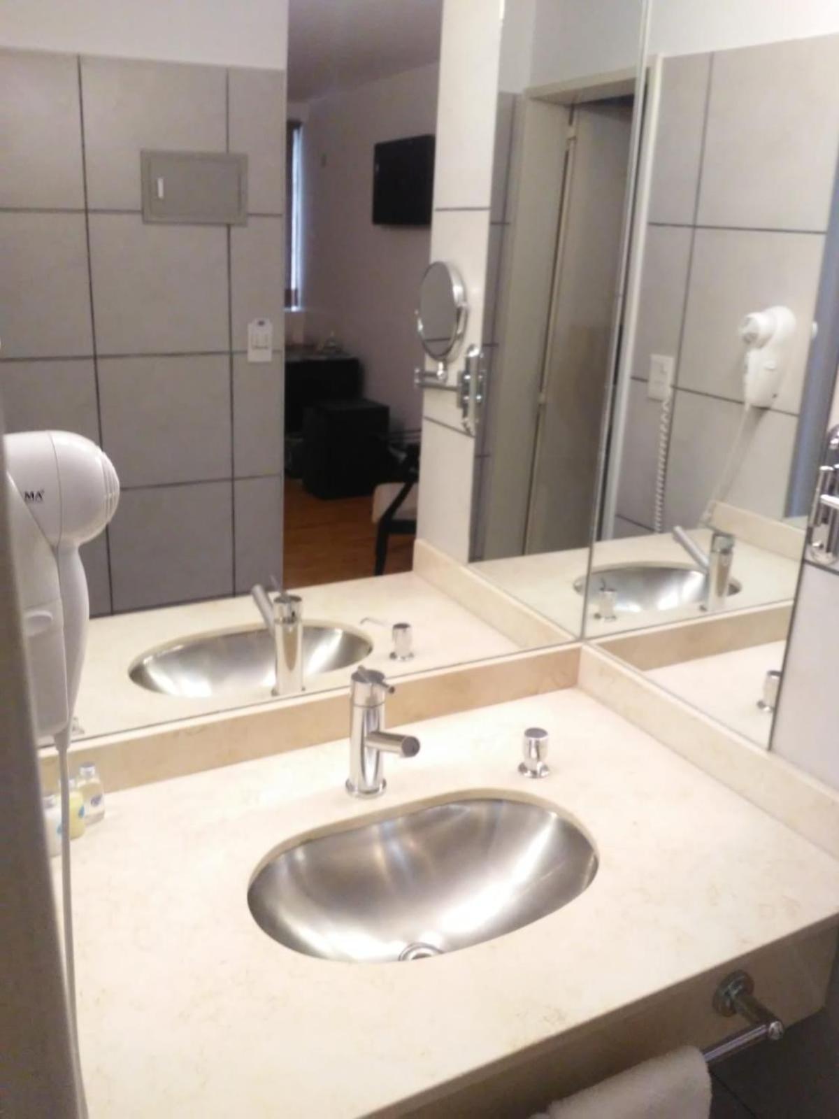 Global Hotel Сентенарио Екстериор снимка