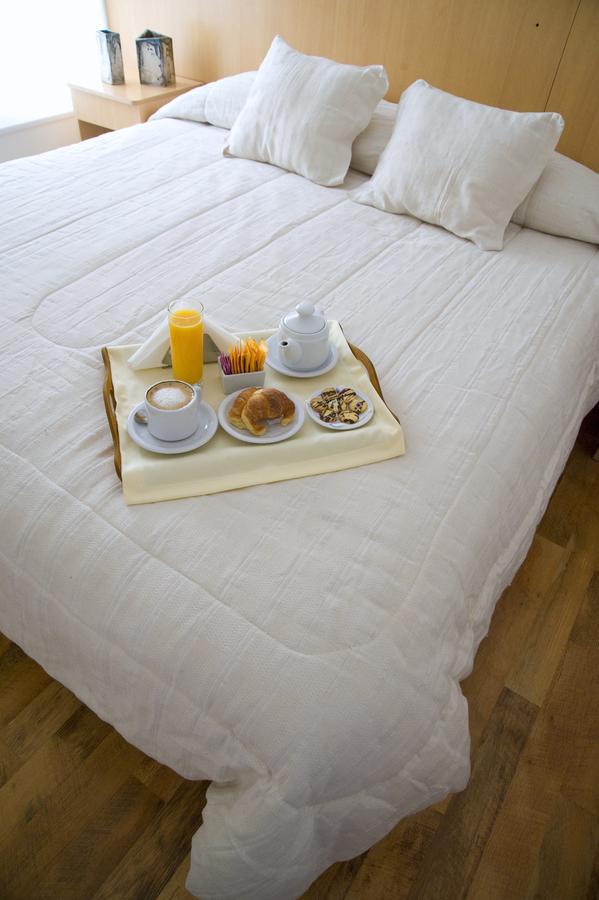 Global Hotel Сентенарио Екстериор снимка